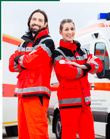 Emergency doctor and paramedic with ambulance