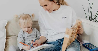 A Mother Teaching her Daughter