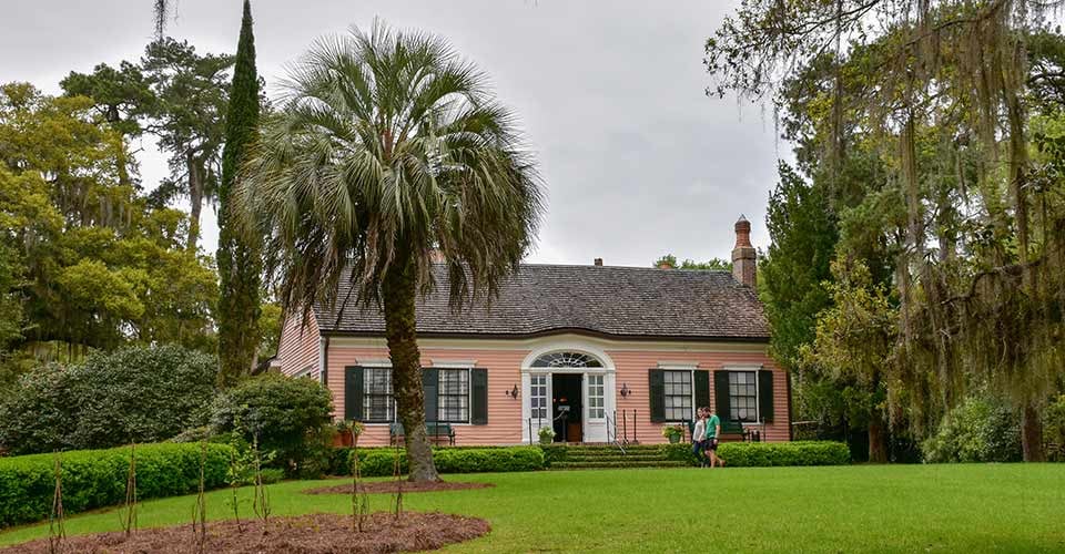 A couple walk outside their home in Tallahassee Florida