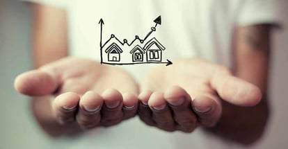 A graph with upward arrow for investment property