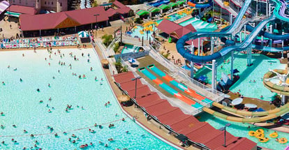 Aerial Panoroma View of Golfland Sunsplash Waterpark with 30 exciting Twisting water rides and attractions