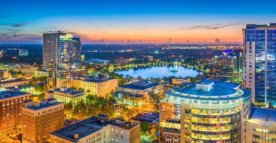 Aerial cityscape towards Lake Eola at dusk in Orlando Florida