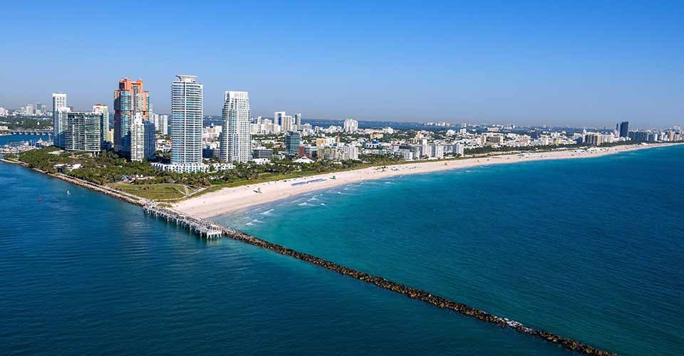 Aerial view of Miami south beach on clear blue sky morning