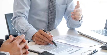 Agent explaining policy to customer