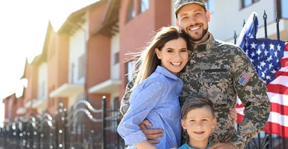American soldier with family outdoors