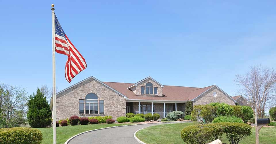 Beautiful Brick Suburban Ranch style home with curved driveway