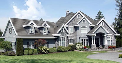 Beautiful luxury mansion with manicured front lawn in florida