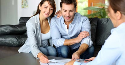 Couple meeting consultant for financial contract