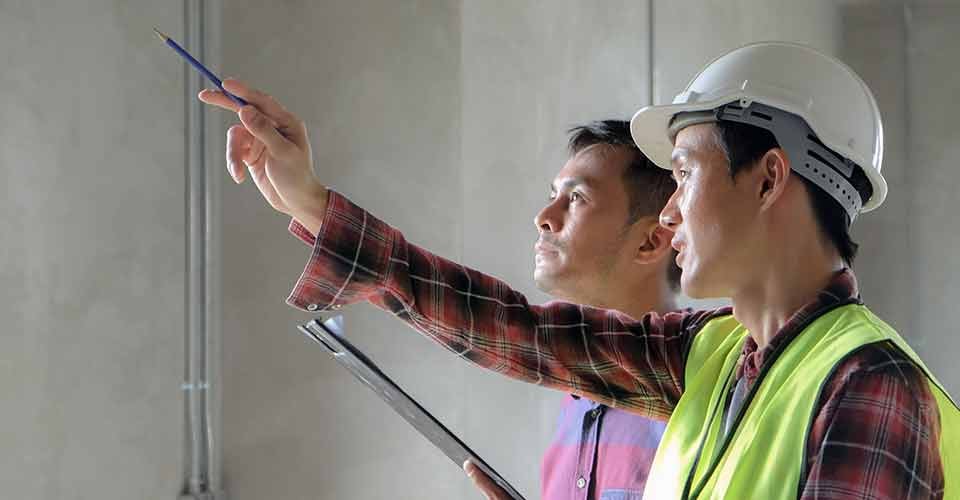 Customer discussing home renovation plan with consultant