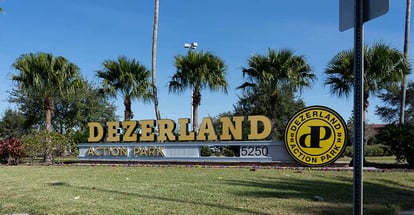 Dezerland Park sign at the entrance in Orlando Florida