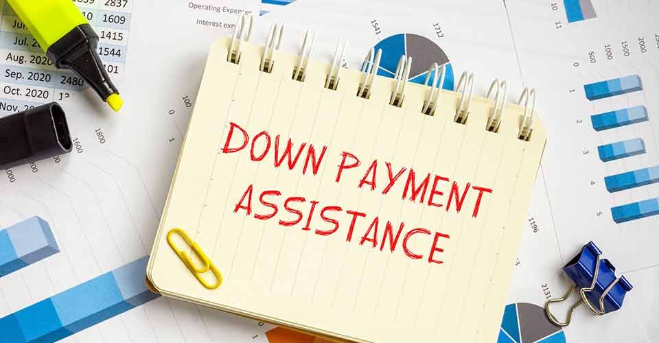 Down Payment Assistance phrase written on notebook