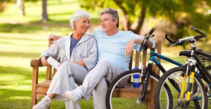 Elderly couple with their bikes