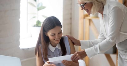 Excited young woman receive gift money from family