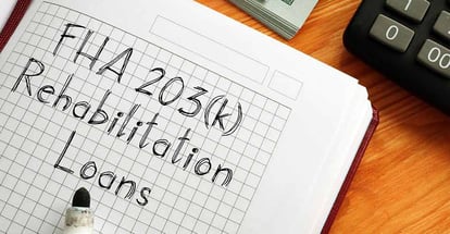 FHA 203k Rehabilitation Loans written on note book
