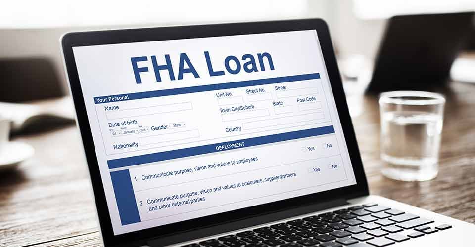 FHA Loan application form on a laptop