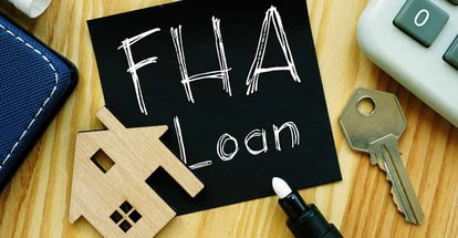 FHA Loan text on black paper