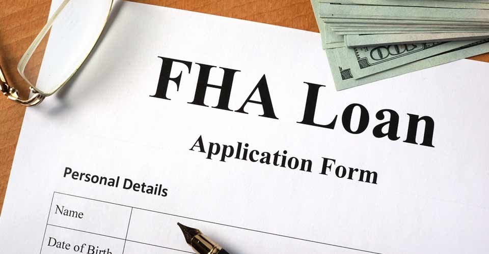 FHA loan form on a wooden table
