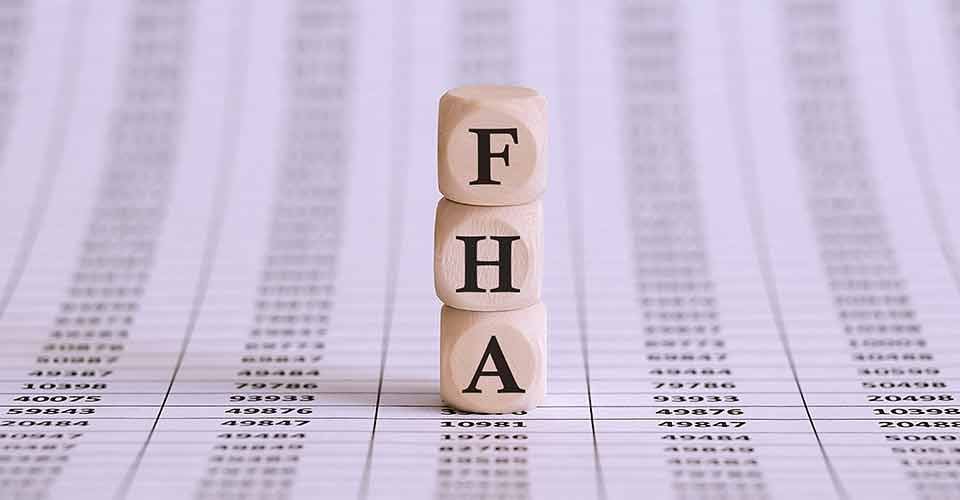 FHA word written on wood block on the chart background