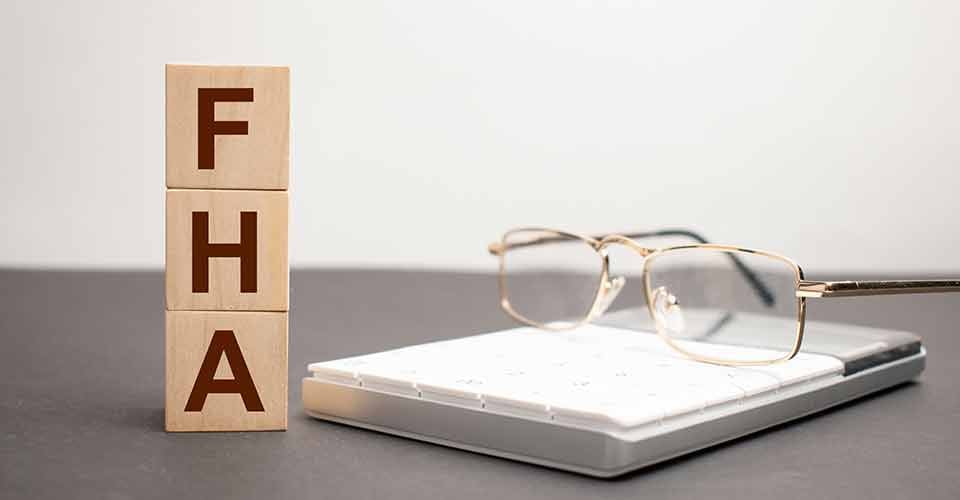 FHA word written on wooden cubes