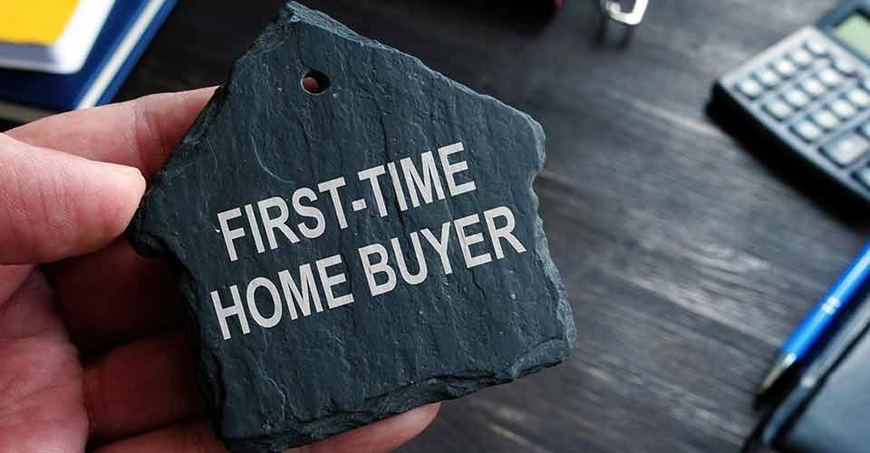First time home buyer words on the stone house symbol