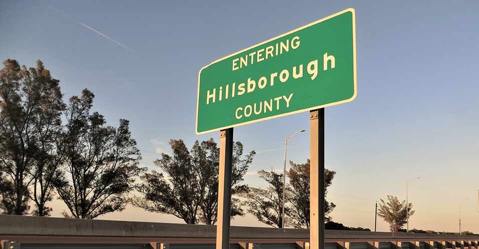 Florida road sign entering Hillsborough County along causeway between Tampa and Clearwater Florida