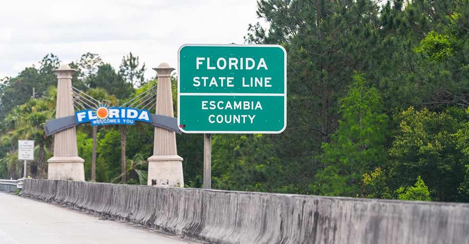 Florida welcome center state line on highway road in Escambia County