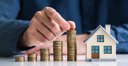 Graph of coin stack for real estate market
