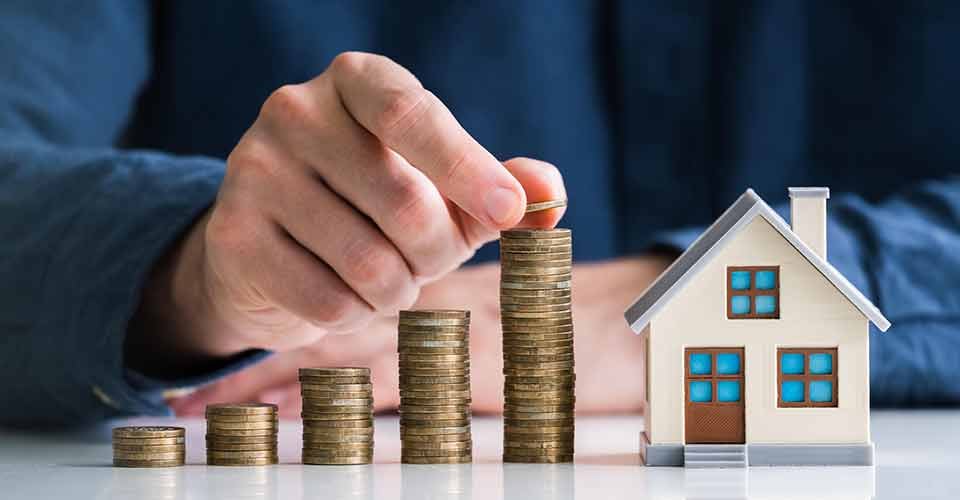 Graph of coin stack for real estate market