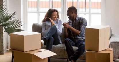 Happy african american couple feeling excited on moving day