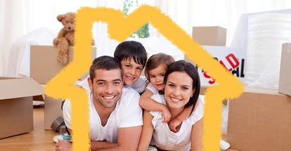 Happy family after buying new house against house outline