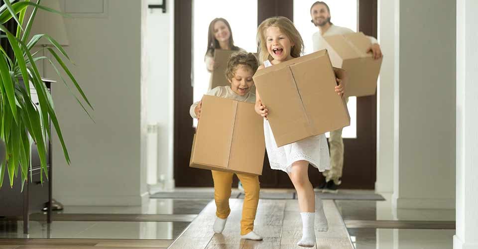 Happy family with kids bought new home