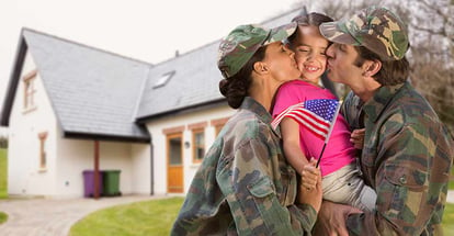 Happy parents in soldiers uniform kissing their daughter outside their new home