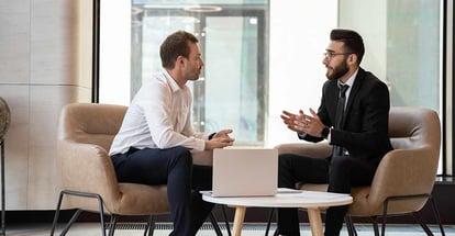 Home buyer and seller negotiating
