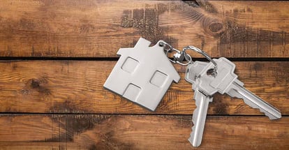 House key on wooden table