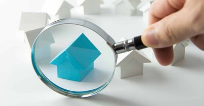 House searching with a magnifying glass
