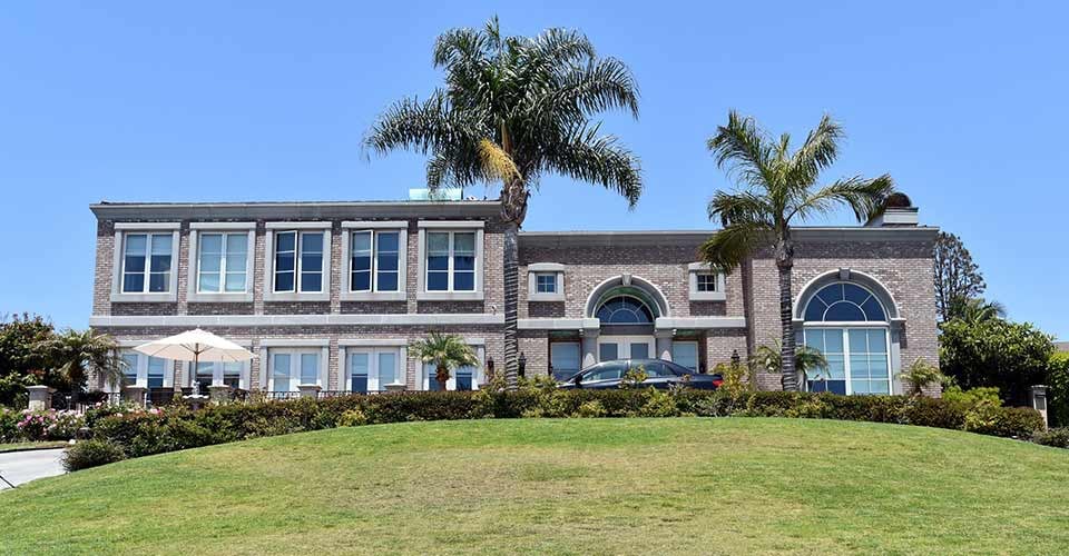 Magnificent modern villas with a large green well groomed lawn