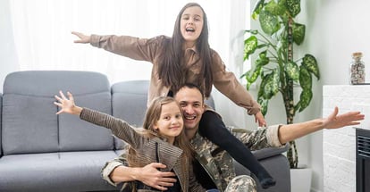Military father and two daughters at new home