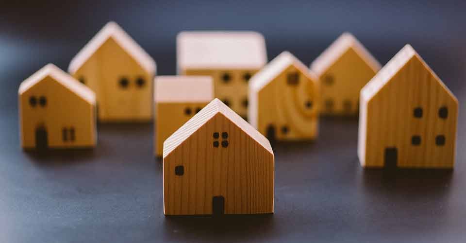 Mini wooden house model for real estate investment