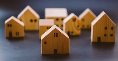 Mini wooden house model for real estate investment