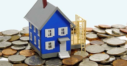 Model home and coins for home renovation