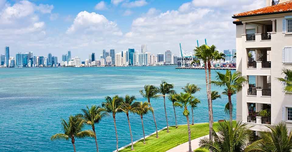 Panoramic view of Downtown Miami and Biscayne Bay with waterfront condo