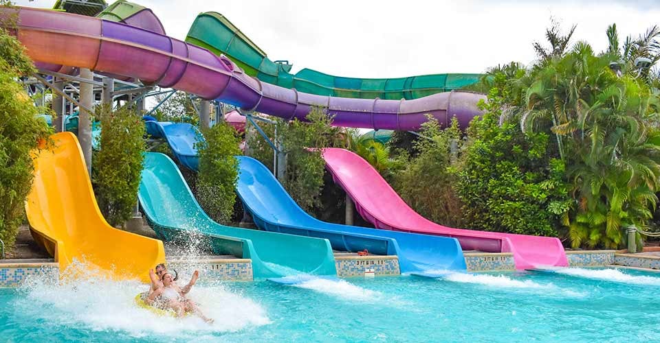 People having fun at water slide in Orlando Florida
