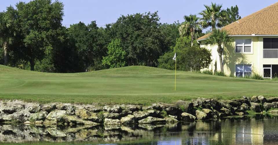Pond and house on golf course in Florida