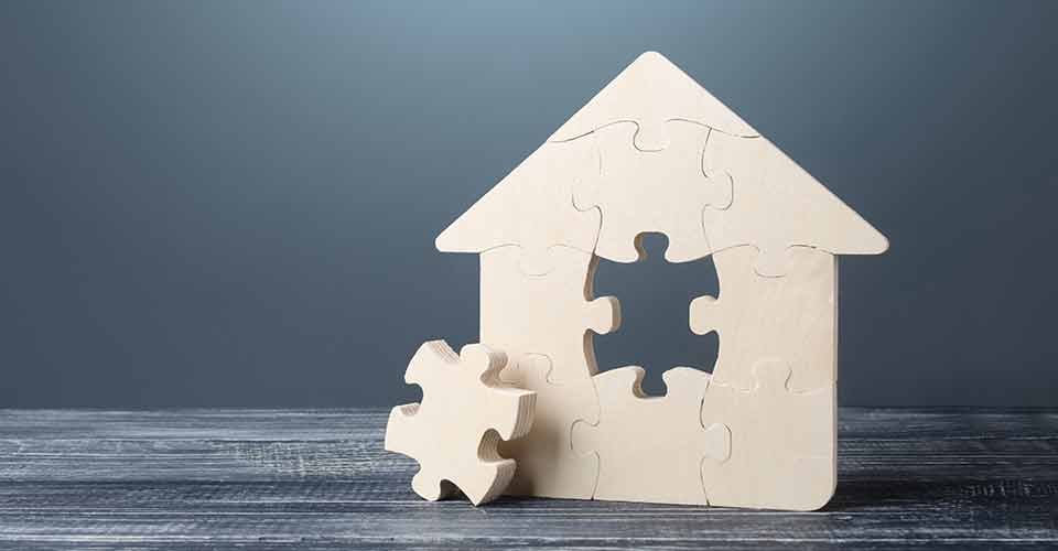 Puzzle house model depicting home equity