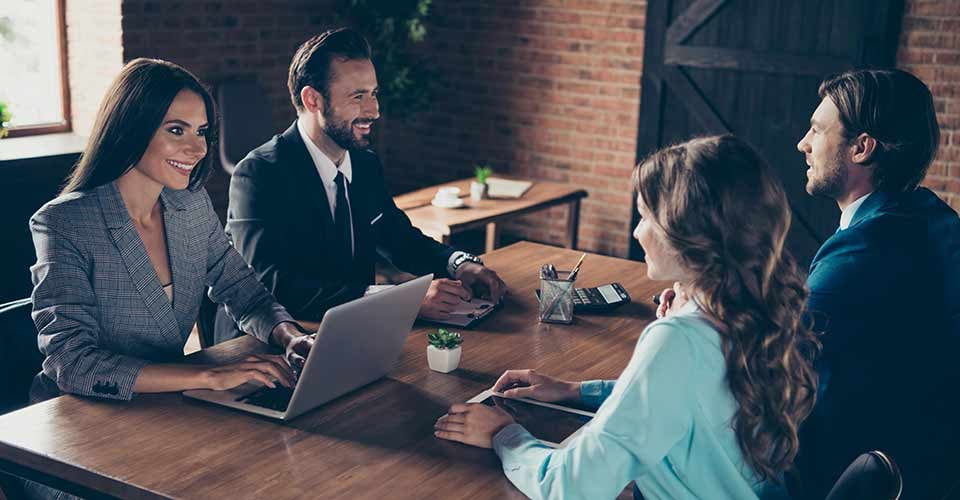 Real estate agent talking to home buyer