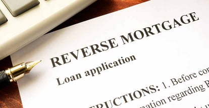 Reverse mortgage application form on a table