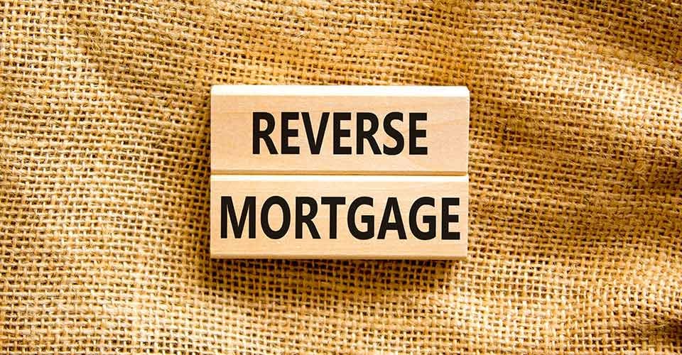 Reverse mortgage words on wooden blocks