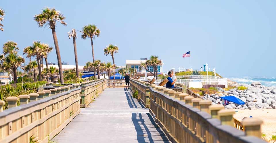 River to Sea Preserve in northern Florida beach by St Augustine with people on sunny day