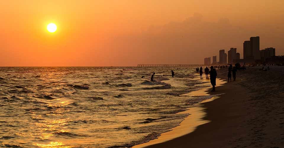 Shoreline of Panama City Beach at sunset in Florida