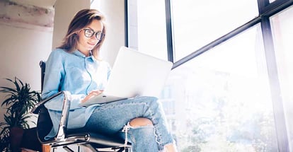 Single Mom using Laptop to research about home loans